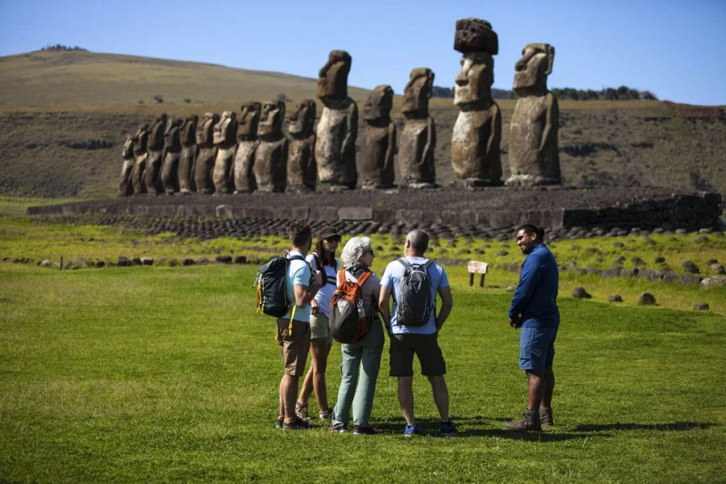 people in eatern island with moais